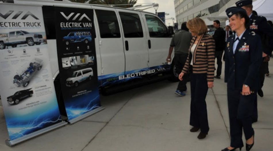 Miranda Ballentine, the assistant secretary of the Air Force for installations, environment and energy, greets vendors during the unveiling of the first federal facility to replace its entire general-purpose fleet with plug-in electric vehicles at Los Angeles Air Force Base in El Segundo, Calif., last month.