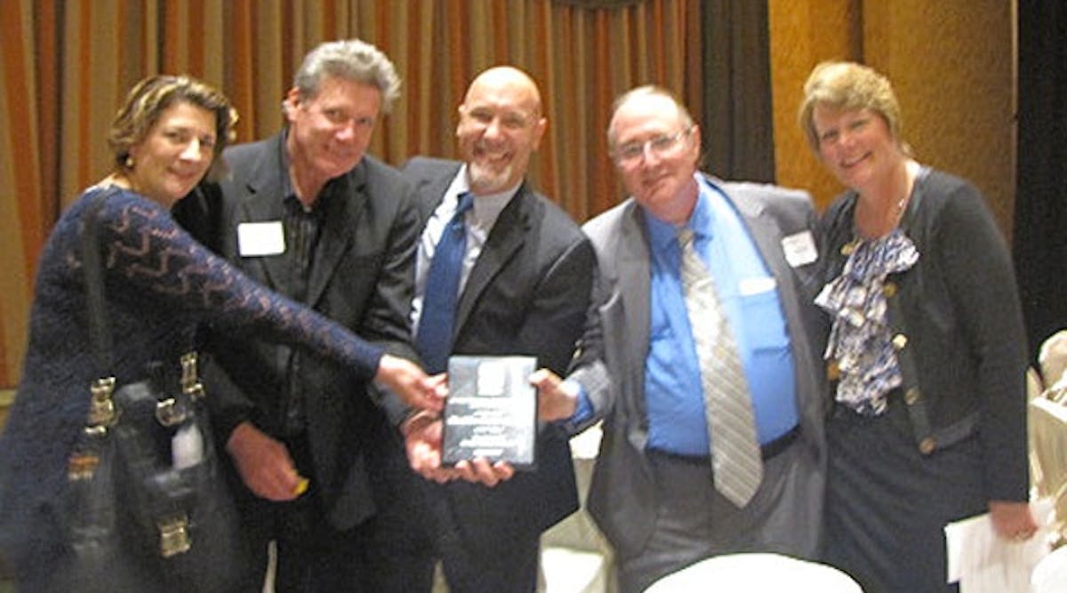 Art Cook (third from left), the company&apos;s CEO, and other long-time veterans of Buckles-Smith look pretty pysched about their entry into the San Jose Silicon Valley Chamber of Commerce Business Hall of Fame. Congratulations!