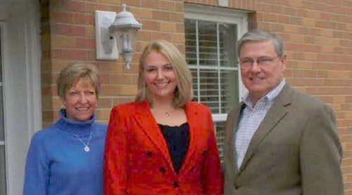 Mike Schaeffer with his wife Brenda and daughter Kris outside of Schaeffer Marketing Group&rsquo;s St. Louis headquarters.