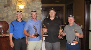 Blazer Electric Supply&apos;s Steve Blazer (left) with some of the happy winners in this year&apos;s tourney.