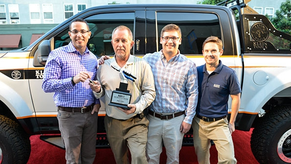 Mark Klein president of sales amp marketing at Klein Tools presents the truck keys to Joey Hall owner of Diamond Electric and Klein39s 2015 Electrician of the Year in the company of David Klein product manager at Klein Tools and Thomas R Klein Jr president of operations research amp development
