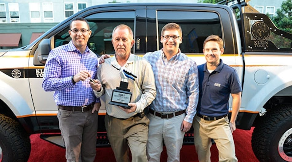 Mark Klein, president of sales &amp; marketing at Klein Tools, presents the truck keys to Joey Hall, owner of Diamond Electric, and Klein&apos;s 2015 Electrician of the Year, in the company of David Klein, product manager at Klein Tools, and Thomas R. Klein Jr., president of operations research &amp; development.