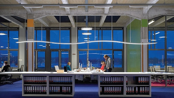 When Thomas Rau founder of the Rau architectural firm in Amsterdam talked with Philips Lighting about the new lighting system he envisioned for this office he told them he wanted lighting that was customizable by the workspace and employee and of course highly energy efficient