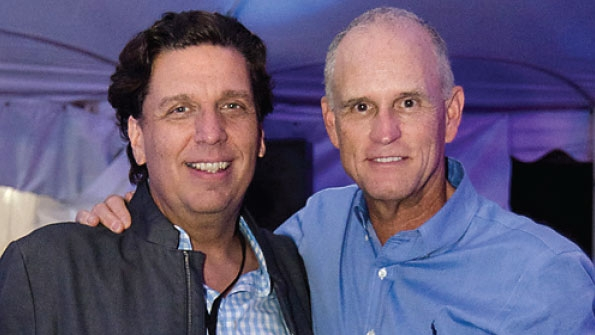 George Vorwick left and Rick Freebery joined in celebration of United Electric Supplyrsquos first 50 years