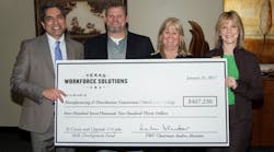 TWC Chairman Andres Alcantar made a Skills Development Fund Grant check presentation to representatives from North Lake College and partnering businesses. In this photo, Crawford Electric Supply HR Manager Renee Blaylock (second from right) and Regional Vice President Kelly Johns (far right) accept on Crawford&rsquo;s behalf. Crawford&apos;s portion of the shared grant was $199,000.