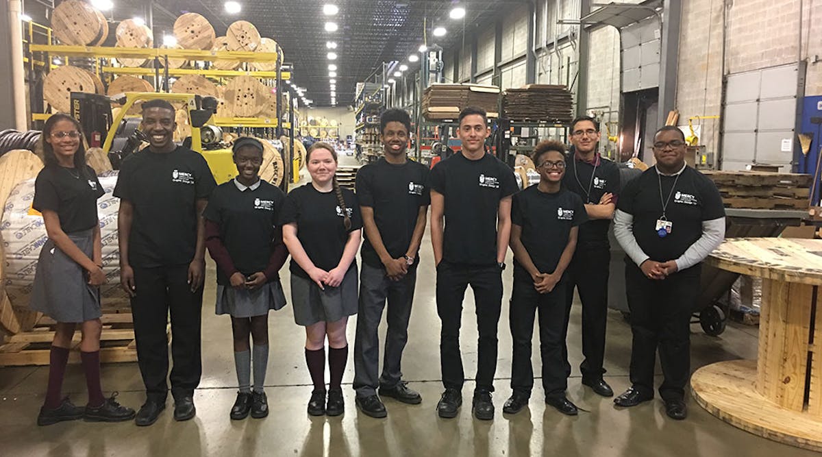 Nine students from Mercy Career &amp; Technical High School&rsquo;s (Mercy CTE) junior class Graphic Design program competed to develop a secondary logo for Omni Cable. Winner Roberto Rodriguez (second from the right) won $2,000 in tuition assistance.