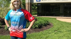 Abby Bertsch, Crescent Electric&apos;s industry marketing manager, promoting one of the custom jerseys the company is supplying for 50 lucky riders participating in Iowa&apos;s famed RAGBRAI bike tour.