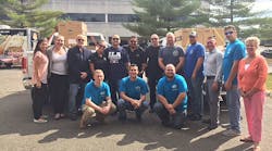 Cooper Electric&apos;s Fairfield staff with members of the International Longshoremen&apos;s Association