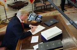 Trump signs tax reform Trump signs tax reform