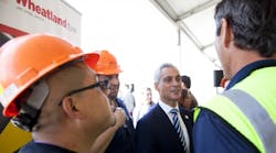 Chicago Mayor Rahm Emanuel greets Wheatland Tube workers at the company&apos;s two-year-old facility in the Windy City.