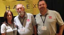 Jay Rains, with his son, Wes, and Kathy Sekerak, a salesperson for Halex, at Western Extralite&apos;s recent 75th Anniversary Trade Show.