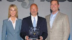 Presenting the award to Nagel (center) were Kathleen Mazzarella, Graybar chairman, president and CEO; and William Mansfield, senior V.P., sales and marketing (right).
