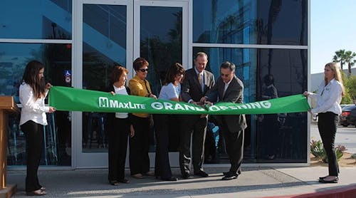 Anaheim City Council members Lucille Kring and Gail Eastman, Robyn Willis of the Habitat for Humanity Anaheim ReStore, Mayor Thomas Tait and MaxLite President and CEO Yon Sung joined to cut the ribbon on Maxlite&apos;s new LEED-certified production and testing facility.