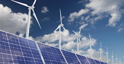 Solar panels and wind turbines against a blue sky. Solar panels and wind turbines against a blue sky.