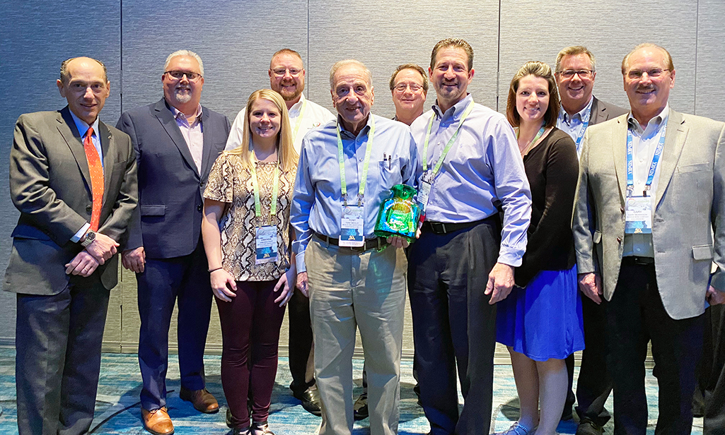 Louis Weisberg, Service Wire's president & CEO (left), presented one of the awards to Meglio & Associates, St. Louis.