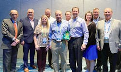 Louis Weisberg, Service Wire's president & CEO (left), presented one of the awards to Meglio & Associates, St. Louis. Louis Weisberg, Service Wire's president & CEO (left), presented one of the awards to Meglio & Associates, St. Louis.