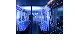 A New York City Metro Transit Authority subway car is bathed in germ-killing ultraviolet light emitted from portable and pole-based fixtures.