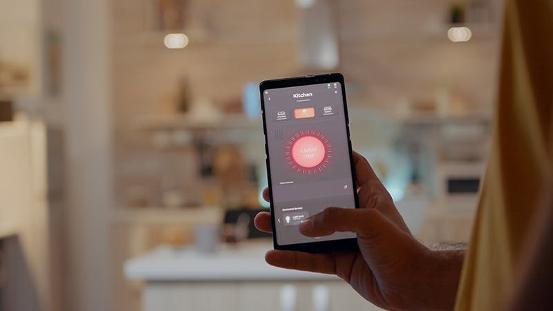 App-based lighting control gives users the power to design, save and remotely control customized lighting scenes. (Photo credit: Dragoscondrea / Dreamstime)