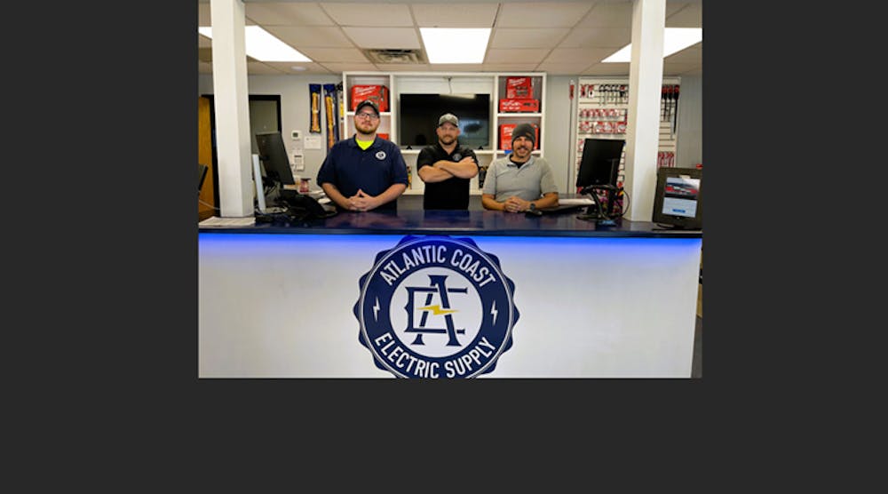 (Left to right) Philip Walker, Jason Hyman and Casey Lever at the counter of Atlantic Coast Electric Supply&apos;s new location in North Charleston, SC.