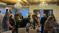 In the Build-a-Bike event at IDEA E-Biz, attendees built 50 bicycles for elementary school students in Denver.